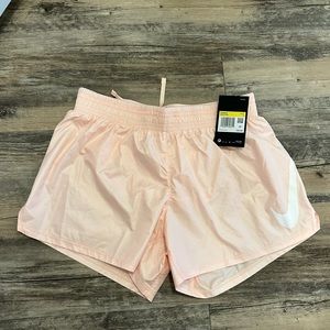 (NWT) Nike light pink (peach) running shorts swoosh size small